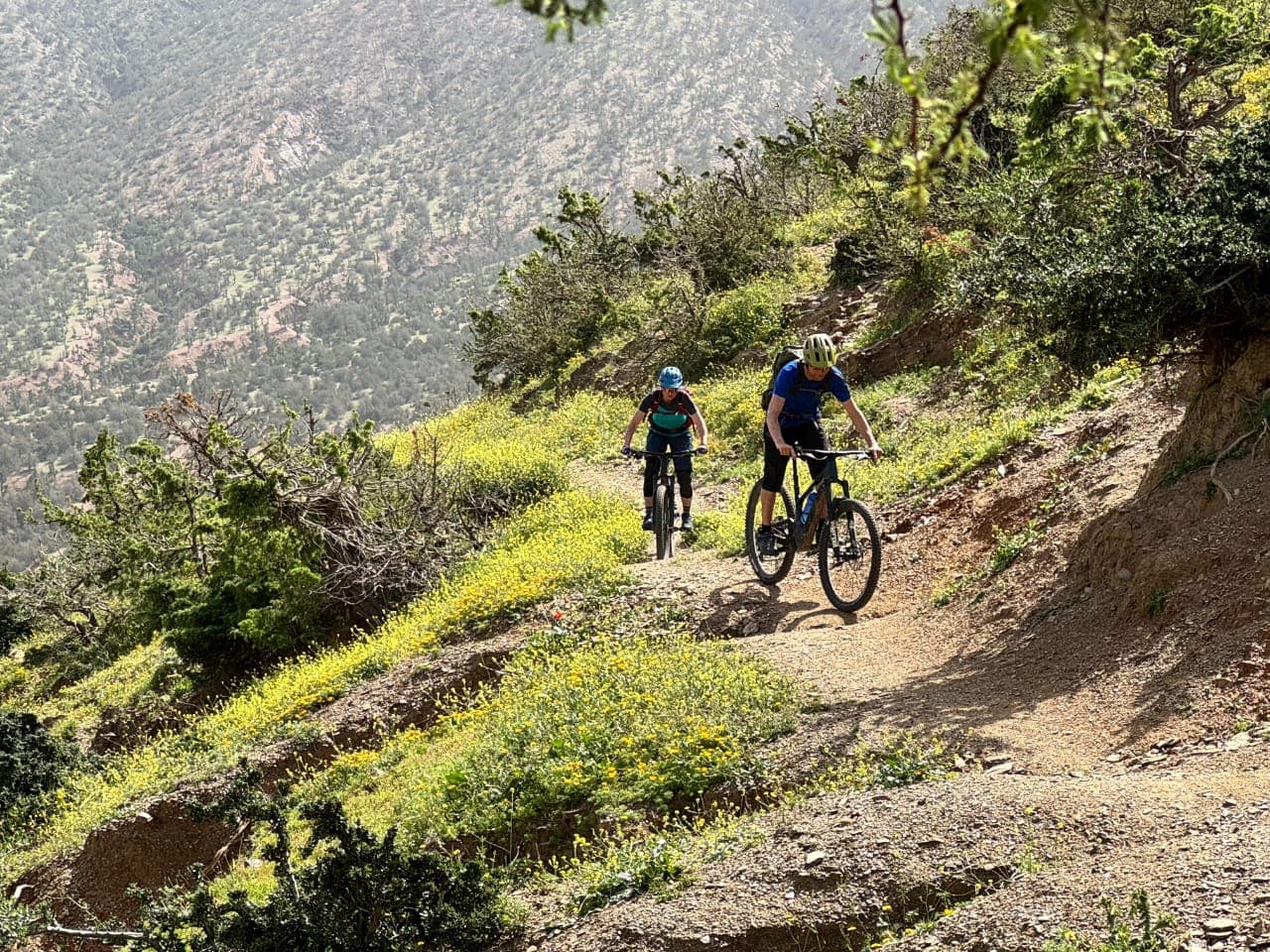 Mountain bikers riding through the Moroccan Atlas