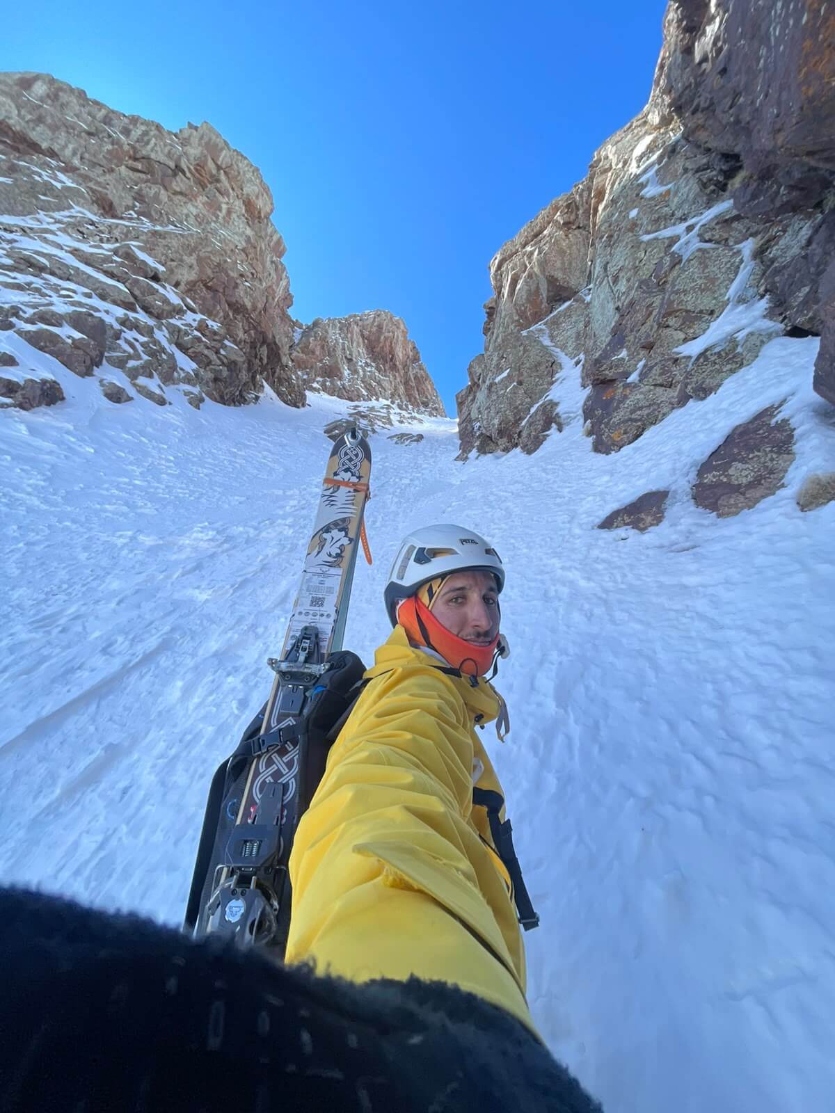 A skier in steep couloir terrain on Tazaghart